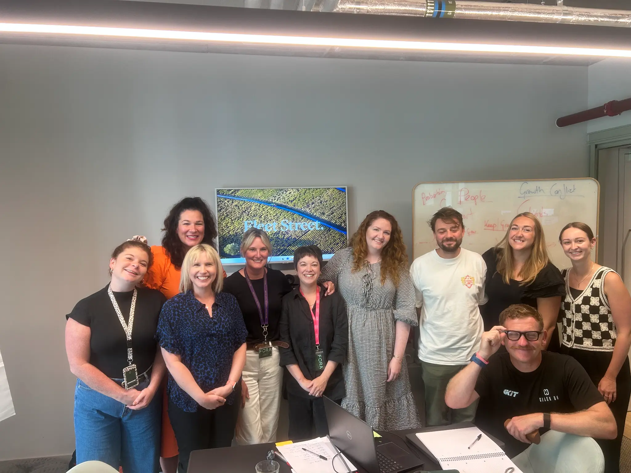 A facilitated group session in a Fleet Street PR-branded working environment